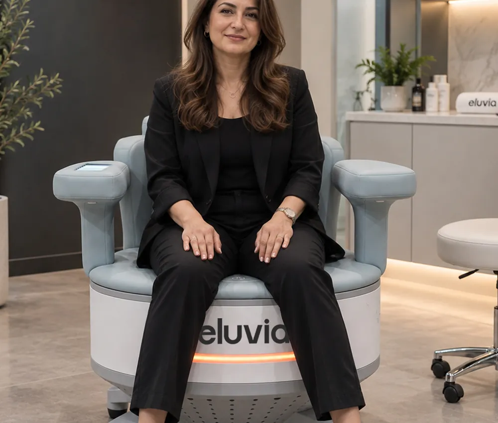 A client seated fully clothed on the Eluvia chair