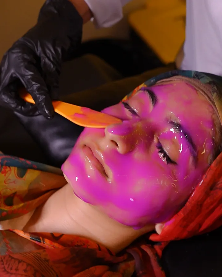 Jelly mask gel being spread over the face at Venus Aesthetics