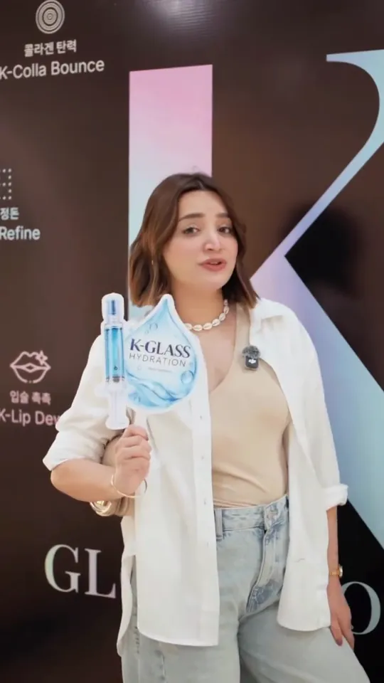 farihaasghar holding the K-Glass Hydration board at the Venus K-Glow launch